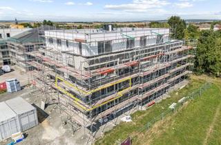 Wohnung kaufen in 61239 Ober-Mörlen, Zum 1.4.2026 bezugsfertig im Erstbezug: Hochwertige 3-Zimmerwohnung mit Balkon und 2 Stellplätzen