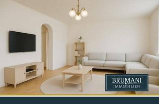 Wohnung kaufen in 79285 Ebringen, BRUMANI | Vielseitige 6-Zimmer-Altbauwohnung mit Balkon und Blick auf die Weinreben in Ebringen