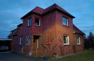 Haus kaufen in 31626 Haßbergen, Haßbergen - Wohnhaus mit Doppelgarage und Carport