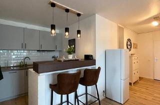 Wohnung kaufen in 24321 Lütjenburg, Lütjenburg - Terrassenwohnung mit Wintergarten