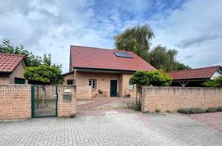 Einfamilienhaus kaufen in 28857 Syke, Exklusives Traumhaus mit idyllischen Garten in Syke-Ristedt