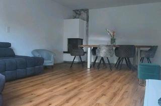 Wohnung kaufen in 40724 Hilden, Hilden - Lichtdurchflutete DG-Wohnung mit Garage, Kamin und Garten