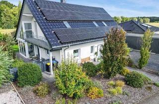 Einfamilienhaus kaufen in 59556 Lippstadt, Lippstadt - Klasse Einfamilienhaus (KfW-70-Standard) mit großzügigem Wohnkomfort und moderner Ausstattung, idyllischem Garten