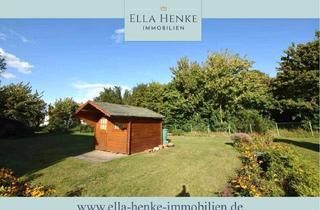 Wohnung kaufen in 38268 Lengede, Mit 450m² Garten! Schöne, modernisierte 3-Zimmer-Wohnung mit Dielen, Einbauküche + modernem Bad.