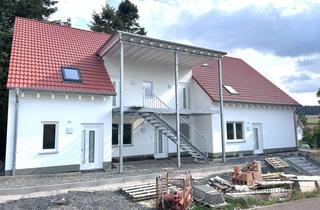 Wohnung kaufen in 36088 Hünfeld, Hünfeld-Oberrombach: Das Raumwunder, das Sie nicht erwarten! KfW 55 Dachgeschoss-Neubau