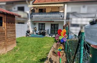 Wohnung kaufen in 55278 Mommenheim, Attraktive 4-Zimmer-Wohnung mit Garten in Mommenheim