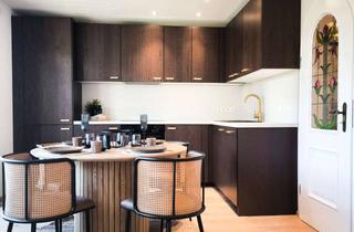 Wohnung kaufen in 83346 Bergen, Reduziert! EG- Wohnung auf zwei Ebenen mit zusätzl. Nutzfläche (25m²)