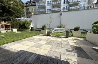 Wohnung kaufen in 76530 Innenstadt, Elegante 4-Zimmer-Wohnung mit Terrasse in Toplage