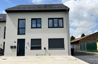 Wohnung kaufen in 52445 Titz, Moderne Neubau-Erdgeschosswohnung 2023 in Titz – Gartenidylle + Energieeffizienz!