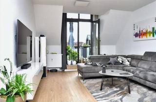 Wohnung kaufen in 40721 Hilden, Im Herzen von Hilden: charmante DG-Wohnung, Aufzug, Balkon und TG-Platz