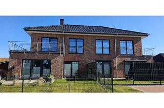 Wohnung kaufen in Astrid-Lindgren-Straße, 25541 Brunsbüttel, Brunsbüttel-Zentrum: Sonnige, große EG-Neubauwohnung mit Garten zu verkaufen!