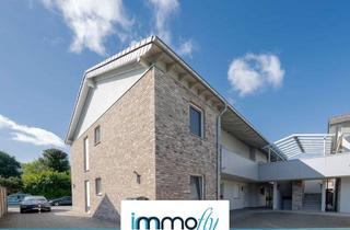 Wohnung kaufen in 41849 Wassenberg, Wohlfühlen auf einer Ebene – moderne EG-Wohnung mit zwei Terrassen