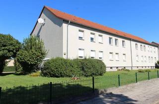 Wohnung kaufen in 06862 Roßlau, Wohnung mit Garten und Garage
