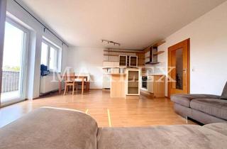 Wohnung kaufen in 94121 Salzweg, Vermietete 2,5-Zimmer-Wohnung über zwei Ebenen