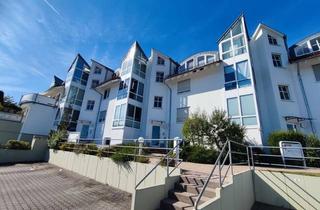 Wohnung kaufen in 61250 Usingen, Exklusives Wohnen mit großer Terrasse in ruhiger Hanglage