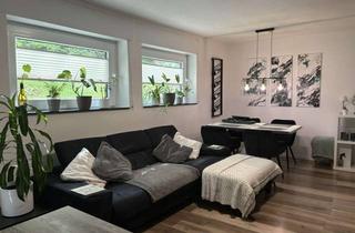 Wohnung kaufen in 56581 Kurtscheid, Naturnah wohnen – moderne 2,5-Zimmer-Souterrainwohnung in Kurtscheid