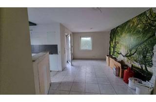 Wohnung kaufen in 47447 Moers, Helle Erdgeschosswohnung mit Süd-Terrasse und eigenem Garten