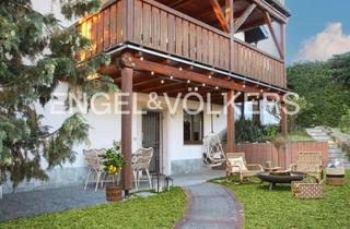 Wohnung kaufen in 61184 Karben, Vermietete Eigentumswohnung mit privatem Garten in zentraler Lage