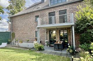 Wohnung kaufen in 41515 Grevenbroich, Exklusives Wohnen im historischen Vierkanthof – Erdgeschosswohnung mit eigenem Garten !