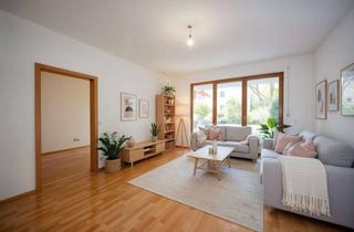 Wohnung kaufen in 85521 Ottobrunn, Charmante Erdgeschosswohnung mit privatem Garten