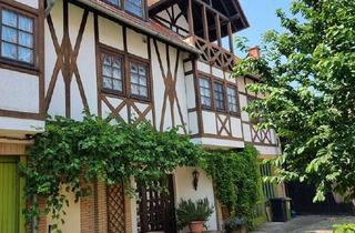 Wohnung mieten in 55234 Erbes-Büdesheim, Stilvolle Maisonettewohnung mit Doppelgarage im charmanten Vier-Gebäude-Ensemble mit Innenhof!