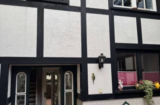 Haus kaufen in Holzweg 21a, 53424 Remagen, Charmantes Fachwerkhaus mit Einliegerwohnung und Sonnenterrasse in Remagen-Oberwinter
