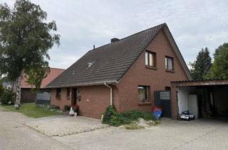 Haus kaufen in 26689 Apen, Zweifamilienhaus in Apen – ca. 157 m² Wohnfläche, renovierte DG-Wohnung, Doppelgarage & Balkon
