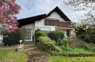 Einfamilienhaus kaufen in 37697 Lauenförde, Familienfreundliches Einfamilienhaus mit Photovoltaikanlage und großem Grundstück in Lauenförde