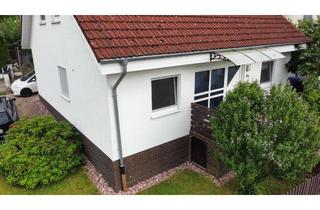 Haus kaufen in 63856 Bessenbach, Modernes Familienparadies mit viel Platz und Komfort