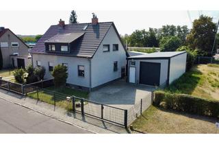 Doppelhaushälfte kaufen in Straße Der Waggonbauer 34, 06132 Silberhöhe, Einziehen und wohlfühlen! Moderne Doppelhaushälfte mit Garten und großer Garage zu verkaufen!