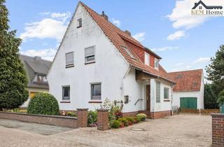 Einfamilienhaus kaufen in 28844 Weyhe, Wohlfühlen für Groß und Klein: Einfamilienhaus mit Dachwohnung und Garten