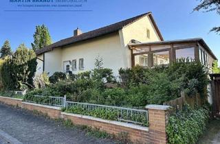 Einfamilienhaus kaufen in 65510 Hünstetten, Freistehendes Einfamilienhaus mit Garage, Hoffläche und Gartengrundstück in Hünstetten-Limbach