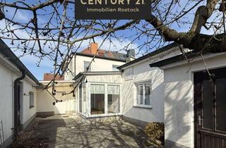 Doppelhaushälfte kaufen in 18273 Güstrow, Charmante Doppelhaushälfte mit Wintergarten und Garage