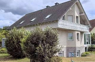 Haus kaufen in 35447 Reiskirchen, Großzügige Kapitalanlage mit 3 Wohneinheiten, Wintergarten und 3 Garagen