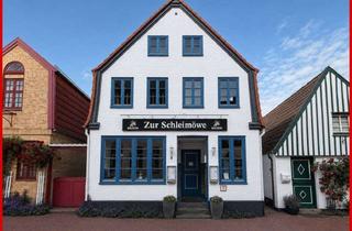 Haus kaufen in 24837 Schleswig, Tradition trifft Potenzial! Fischrestaurant mit Wohnungen & Schleiblick