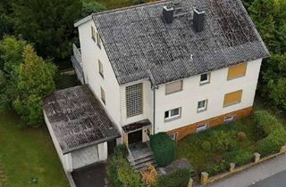 Haus kaufen in Kurt-Schumacher-Straße 31, 65232 Taunusstein, Stark sanierungsbedürftiges Zweifamilienhaus in Waldrandlage von Taunusstein-Bleidenstadt