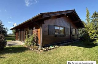 Haus kaufen in 56477 Zehnhausen, Urlaub zu Hause! Gemütlicher Holzblock-Bungalow auf über 1.112 m² großem Grundstück!