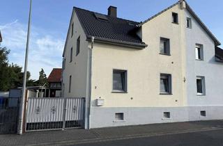 Einfamilienhaus kaufen in 63110 Rodgau, Charmantes Einfamilienhaus mit Potenzial – auch als Zweifamilienhaus nutzbar