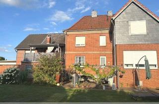 Haus kaufen in 31275 Lehrte, Lehrte - Immensen: Solides 2-Familienhaus mit bezauberndem Garten und Doppelcarport