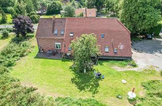 Mehrfamilienhaus kaufen in 26446 Friedeburg, Vermietetes Mehrfamilienhaus mit Entwicklungsspielraum