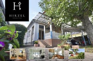 Einfamilienhaus kaufen in 65479 Raunheim, Allrounder Immobilie: Einfamilienhaus mit vermieteter Einliegerwohnung im Raunheimer Ortskern