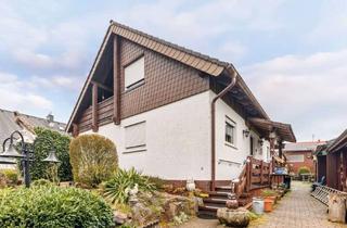 Einfamilienhaus kaufen in 67705 Trippstadt, Attraktives Einfamilienhaus mit Gartenidylle und Sonnenterrasse