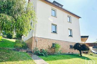 Mehrfamilienhaus kaufen in 35796 Weinbach, Kapitalanlage in Weinbach – Mehrfamilienhaus mit 3 Wohneinheiten, Garten und Mieteinnahmen