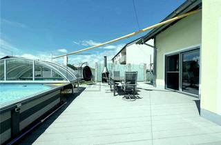 Einfamilienhaus kaufen in 89182 Bernstadt, Energieeffizientes Einfamilienhaus (12 kWh/m²) mit beheiztem Pool auf 1.093 m² Grundstück