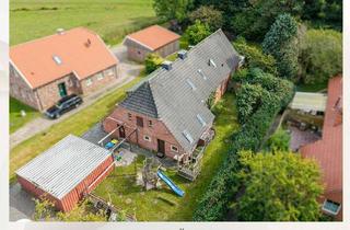 Haus kaufen in 26632 Ihlow, Fehnhaus-Hälfte in ruhiger Lage mit Garten und Ausbaupotenzial