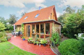 Haus kaufen in 24401 Böel, Einklang mit der Natur: Lehmhaus mit Traumgarten für Familien