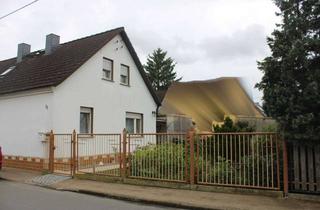 Haus kaufen in 04886 Arzberg, Solides Wohnhaus mit Potenzial und zusätzliche Nebengelasse für Hobby oder gewerbliche Zwecke in Blu