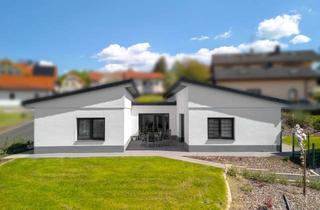Einfamilienhaus kaufen in 36148 Kalbach, Moderner Niedrigenergie-Bungalow (KfW 55) mit großer 3-fach-Garage in ruhiger Lage