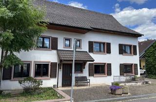 Mehrfamilienhaus kaufen in 79618 Rheinfelden, Mehrfamilienhaus mit weitläufiger Grünfläche und Garagengrundstück – Ideal für eine große Familie od