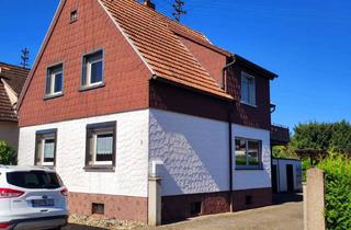 Haus kaufen in Siedlerstraße, 76776 Neuburg, Ein-/Zweifamilienwohnhaus mit Carport, großem Grundstück und schönem Garten in Neuburg am Rhein